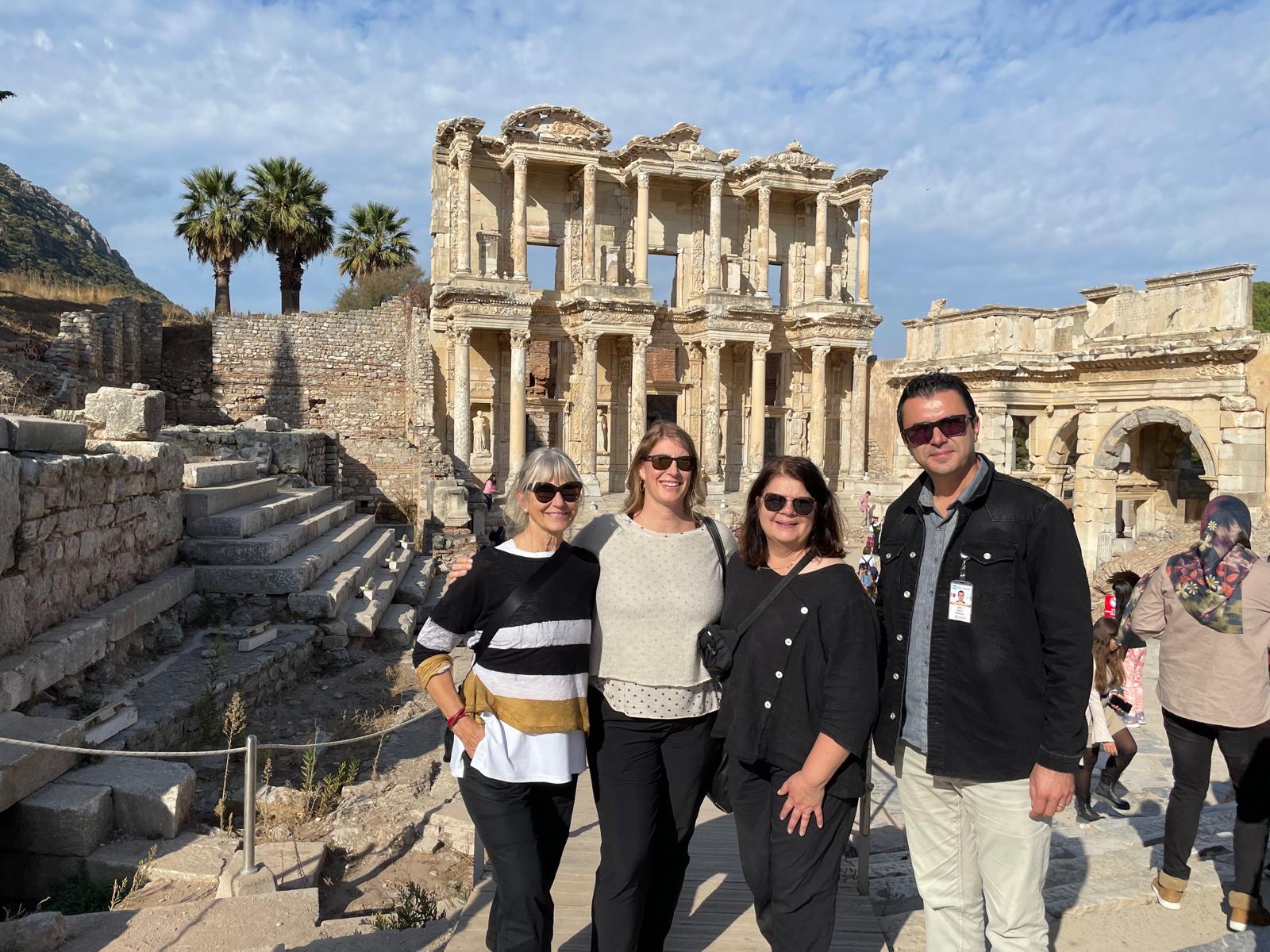 Library of Celsus and visitors exploring ancient Ephesus